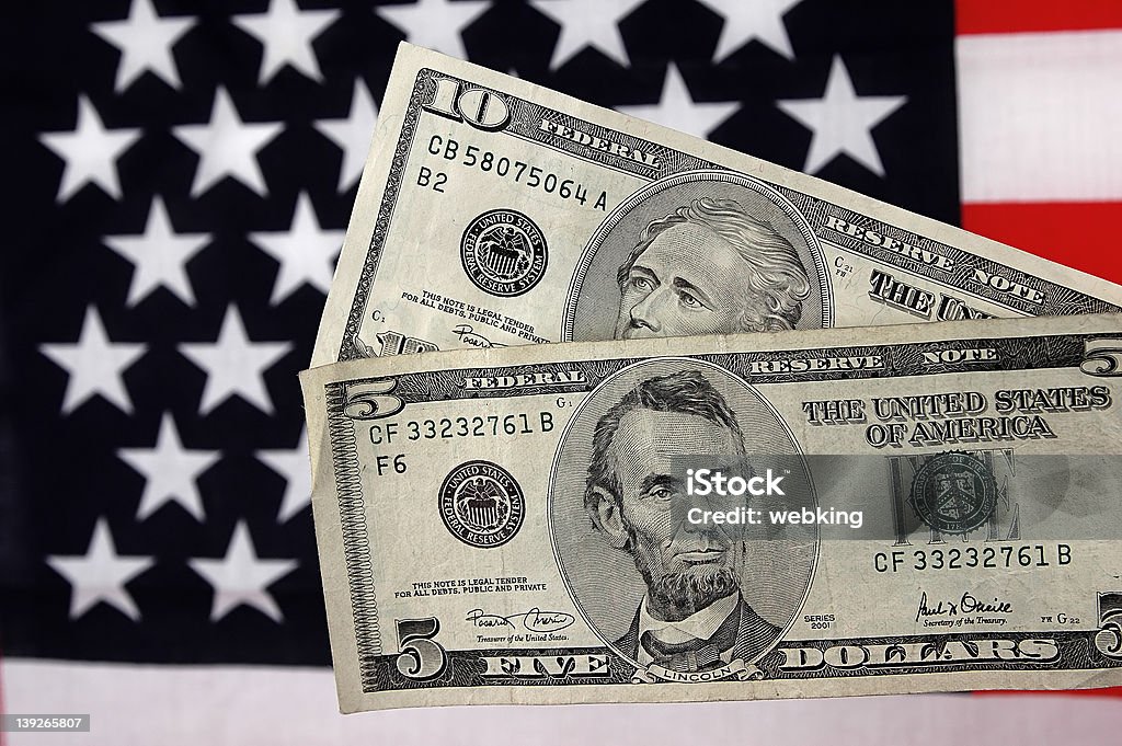 Five and Ten Photo of a Five and Ten Dollar Bills. Number 5 Stock Photo