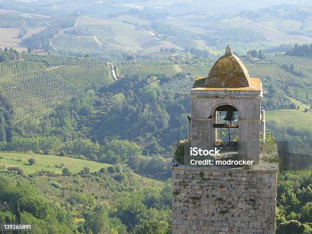 Bell Tower And Tuscan Landscape In San Gimignano Stock Photo - Download Image Now - Agriculture, Ancient, Awe