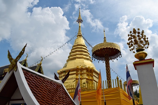 Golden pagoda at Wat Phra that Doi Kham, Temple with Scenic View in Chiang Mai, THAILAND.