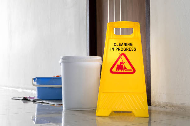 istock Yellow warning sign with message Cleaning in progress 1392666906