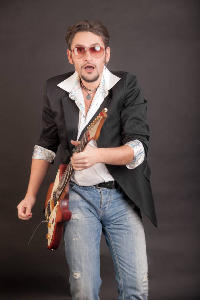 istock man playing electric guitar 1392667117