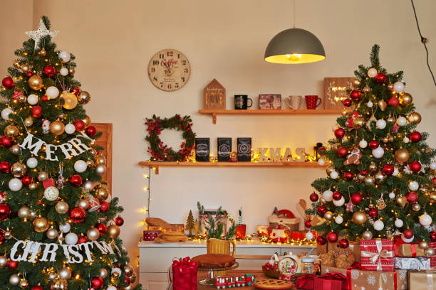 istock Christmas kitchen. Red and gold decor christmas tree background. New Year celebration. Merry Christmas and Happy New Year. 1392667940