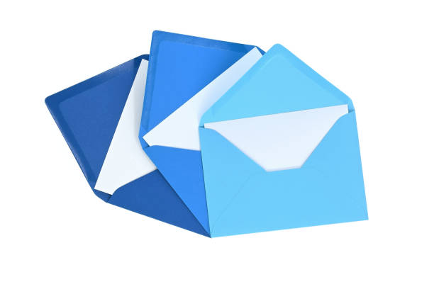 istock Envelopes of blue hues with blank white card 1392671704