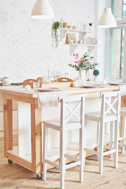 istock White kitchen in interior loft style. Valentine's day kitchen decor. Kitchen utensils and shelves. 1392676509