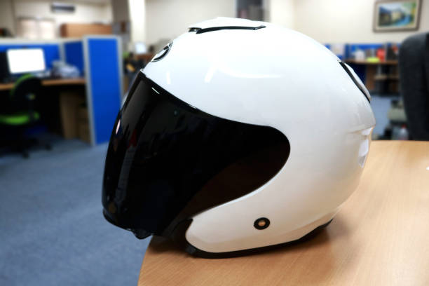istock A white motorcycle helmet with black glass as a shield 1392680191