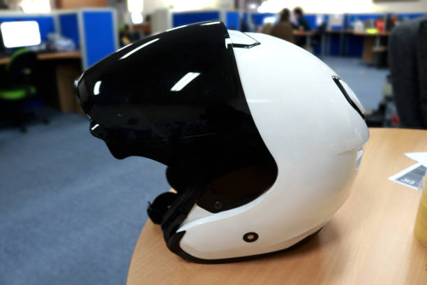 istock A white motorcycle helmet with black glass as a shield 1392680199