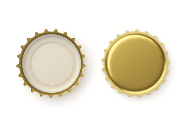 Golden beer caps mock up isolated on white background. 3d rendering. Golden beer caps mock up isolated on white background. Empty metal soda caps mockup. 3d rendering illustration. bottle cap stock pictures, royalty-free photos & images