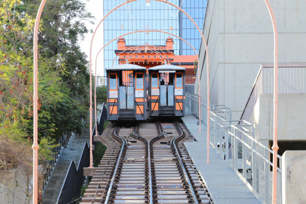 Subway train moving on the railway bridge over the river in Vienna, Austria.