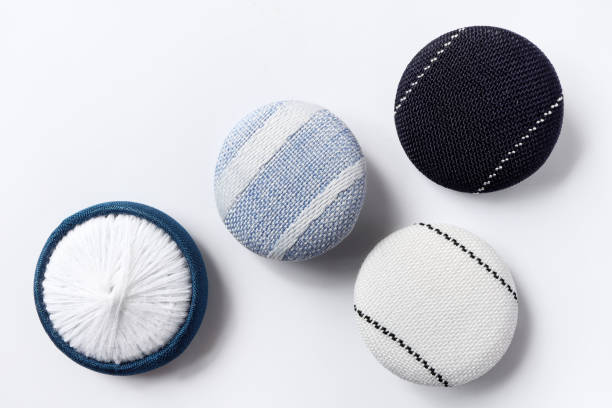 istock Fabric buttons background, Craft, needlework concept. Cloth buttons on white background, Top view. 1392681280