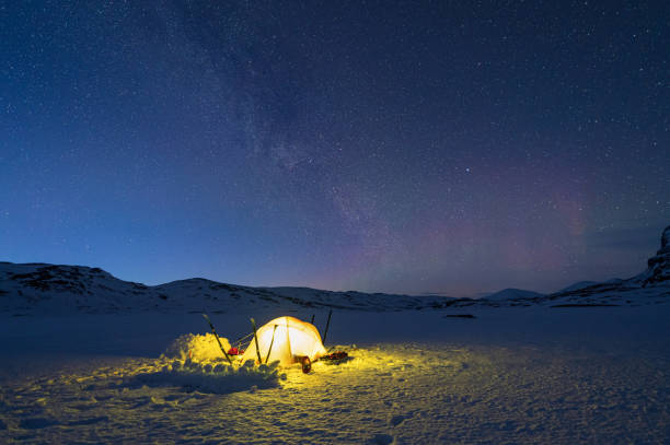 istock Winter campsite with stars 1392683001