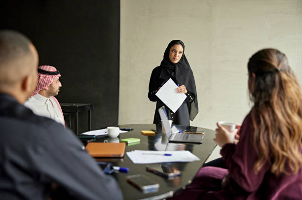 istock Riyadh businesswoman presenting ideas to project team 1392683022