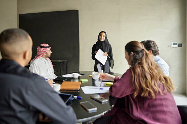 istock Team of Riyadh business people discussing projects plans 1392683024