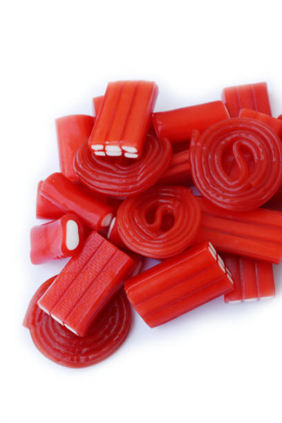 istock Various sweet red candies on white 1392686292