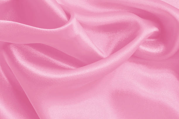 istock Pink fabric cloth texture for background and design art work, beautiful crumpled pattern of silk or linen. 1392686759