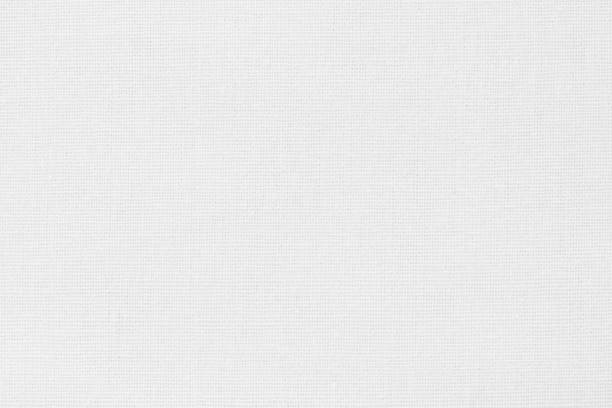istock White cotton fabric texture background, seamless pattern of natural textile. 1392686793