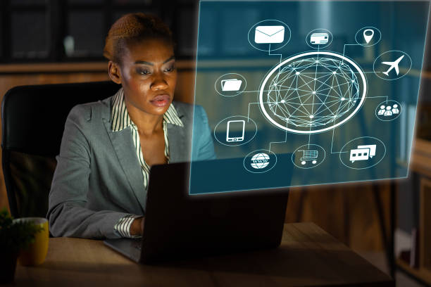 istock An african descent woman working with hologram technology 1392687767