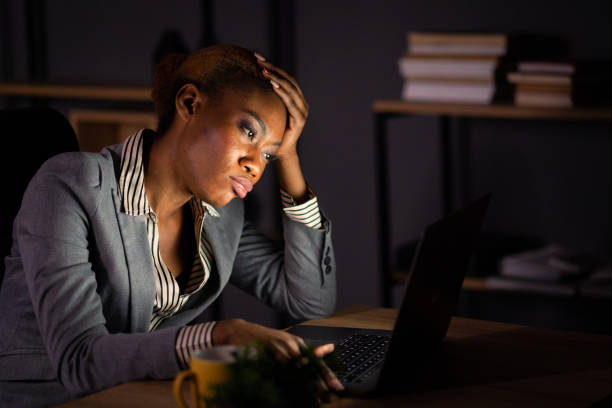 istock A late night in a dark office 1392687988