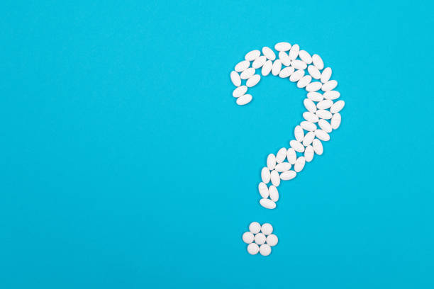 istock White Question Mark. Pharmaceutical Industry and Medicinal Products 1392690870