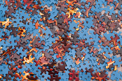 Top View of Mixed Peaces of a Jigsaw Puzzle - Texture Background