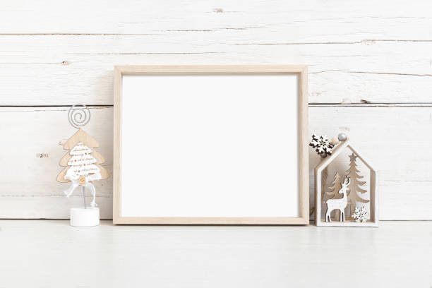 istock Horizontal wooden frame mockup with christmas attributes. 1392691930