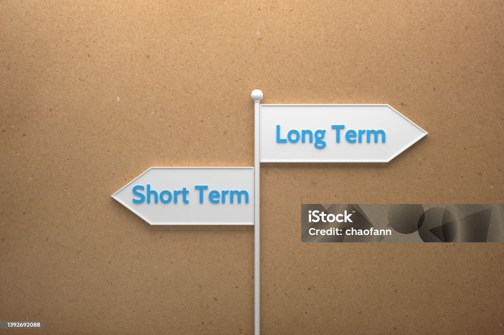 Long or Short? Decision Text Stock Photo