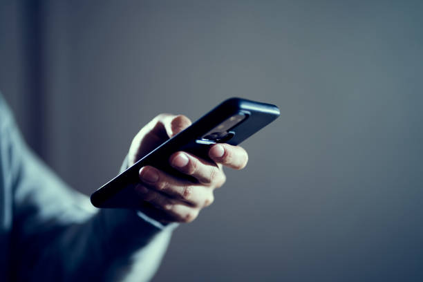 Men's hands spreading bad publicity on SNS