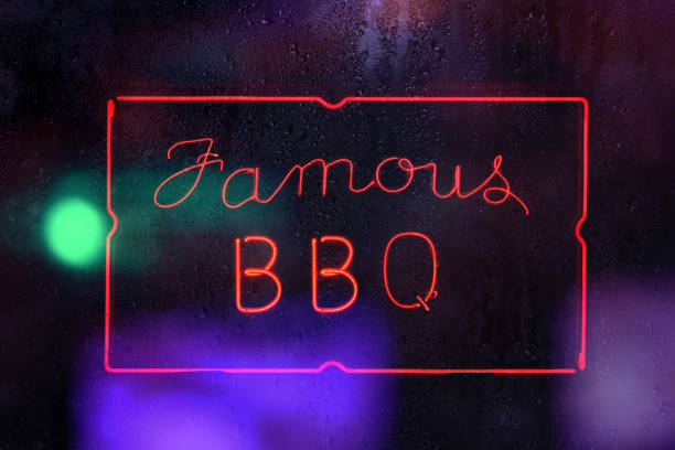 istock Vintage Famous Barbecue Sign in Rainy Window 1392697678