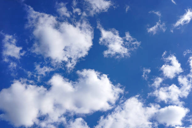istock Blue sky with white clouds background picture 1392699939