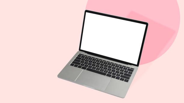 istock Computer laptop isolated on pink pastel background. Blank display for graphic display montage. 1392701984