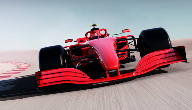 istock red race car driving on a race track 1392703244
