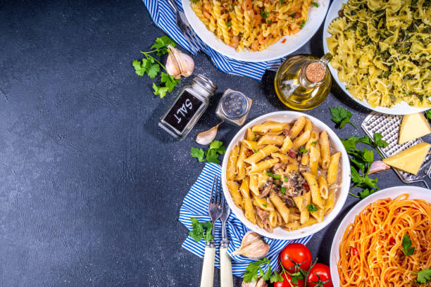 istock Set of cooked pasta with different sauces 1392706302