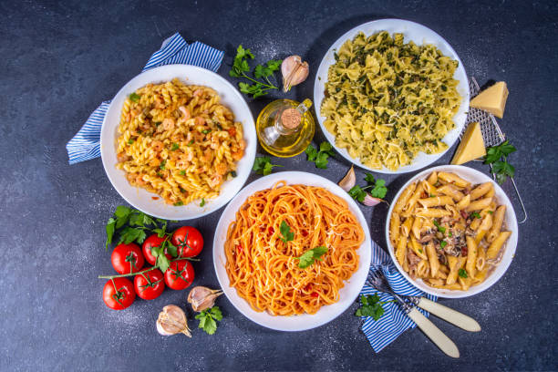 istock Set of cooked pasta with different sauces 1392706319