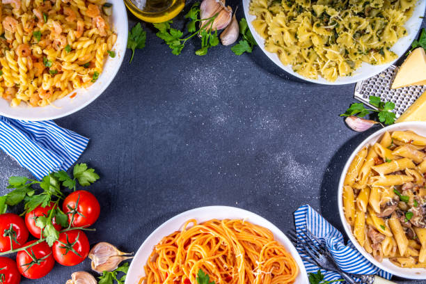 istock Set of cooked pasta with different sauces 1392706342