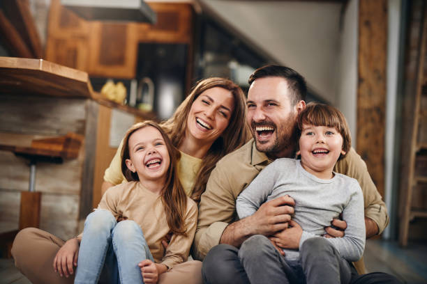 istock Cheerful family having fun at home. 1392707387