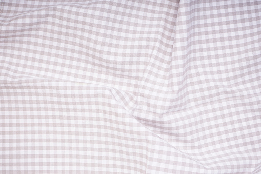 Close-up of vintage checkered towel - textured background, top view.