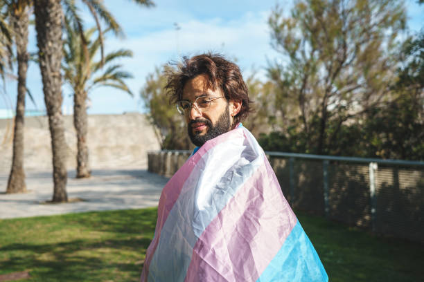 istock Bearded man with LGBT flag 1392711580