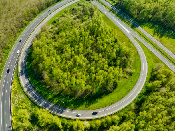 istock Highway junction aerial view during springtime 1392711943