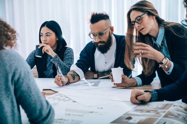 istock Business professionals working together 1392712877