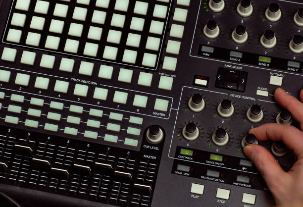 istock Music making with audio controller in sound recording studio 1392715651