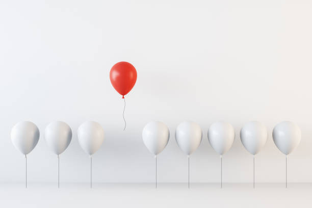 istock Creative white and red ballons on white wall background. Leadership and teamwork concept. 3D Rendering. 1392715735