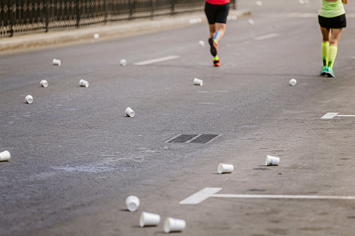 point of water marathon race. used plastic cups on asphalt