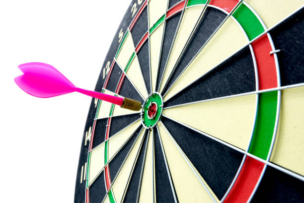 istock Dart arrow in the target center 1392715869