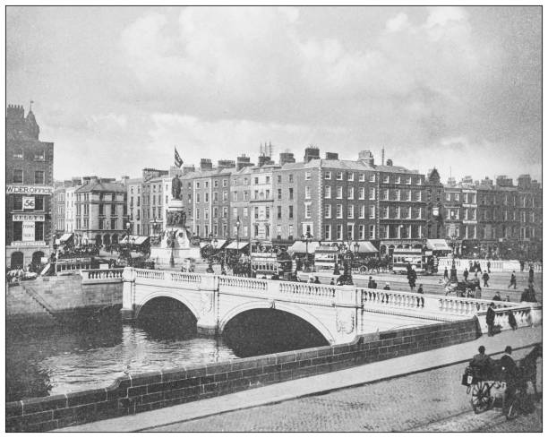 античная фотография ирландии: мост о'коннелл, дублин - oconnell bridge stock illustrations