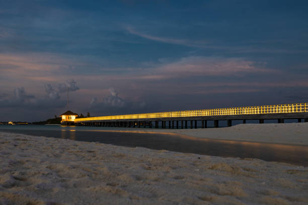 Iluminated bridge on a beach of Maldives
