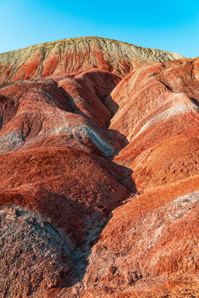 istock Red sand mountains in the desert area 1392717042