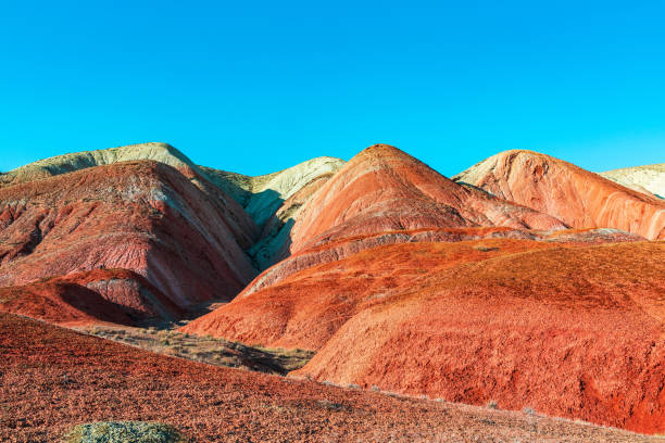 istock Red sand mountains in the desert area 1392717328