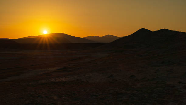 istock Bright sunset in the mountains 1392717433