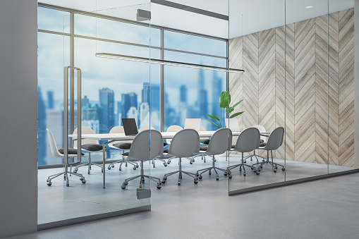 Bright concrete and wooden, glass conference room interior with window and blurry city view, furniture and equipment. 3D Rendering