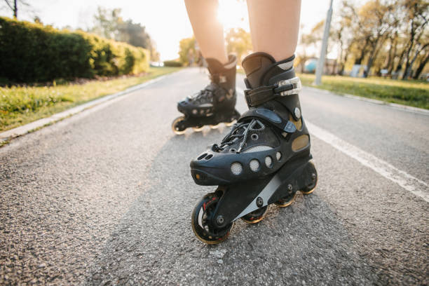 istock Close-up of rollerblades at sunset 1392720610