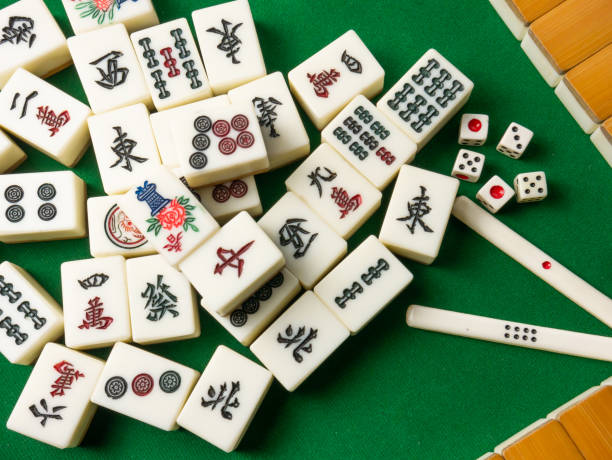 istock The mahjong on table ancient asian board game close up image 1392721359